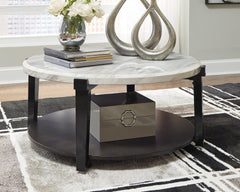 Janilly Signature Design by Ashley Round Cocktail Table image